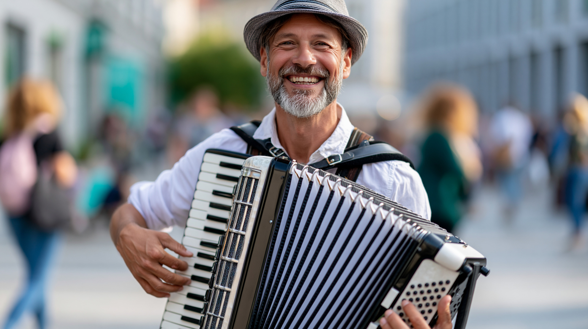 Man playing accordion at an international street theatre festival in a city, smiling performer, festive outdoor event, defocused crowd background, with copy space Man playing accordion at an international street theatre festival in a city, smiling performer, festive outdoor event, defocused crowd background, with copy space